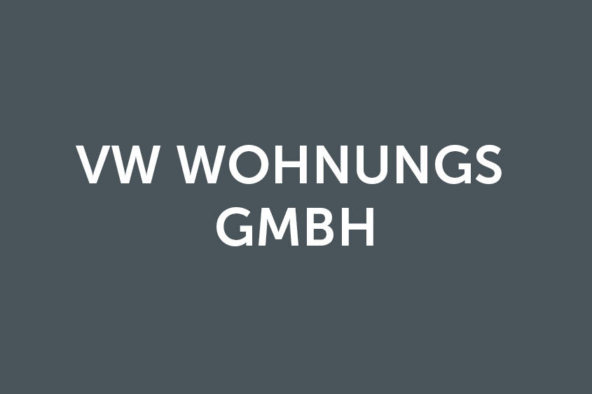 Weißes VW Wohnungs GmbH Logo auf grauem Hintergrund