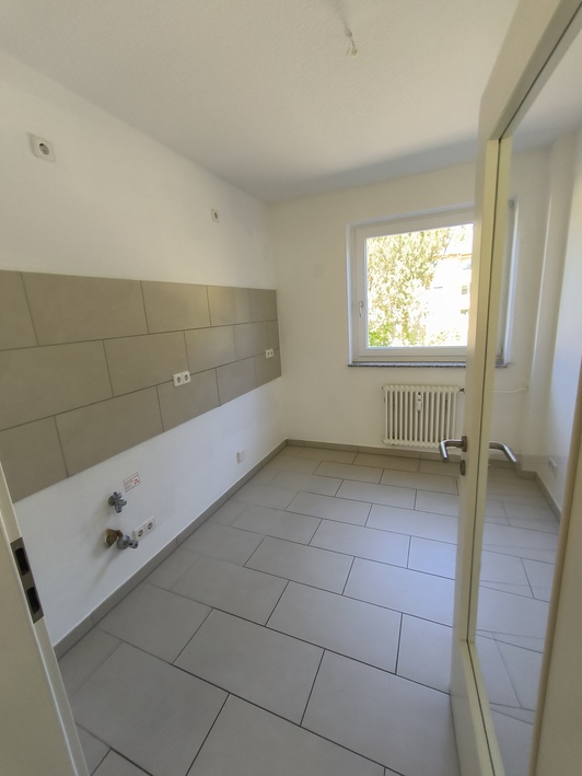 Erdgeschosswohnung mit geräumigem Wohnzimmer - Photo 2