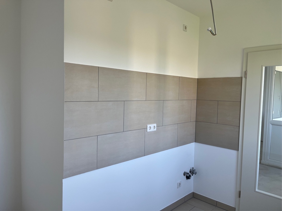Modernisierte Wohnung mit Aufzug im Haus - Foto 5