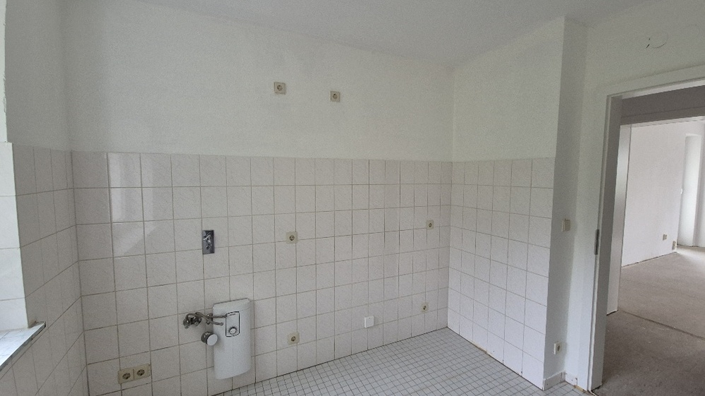 Wohnen im Grünen: Attraktive Wohnung mit schönem Mietergarten und Loggia - Foto 1